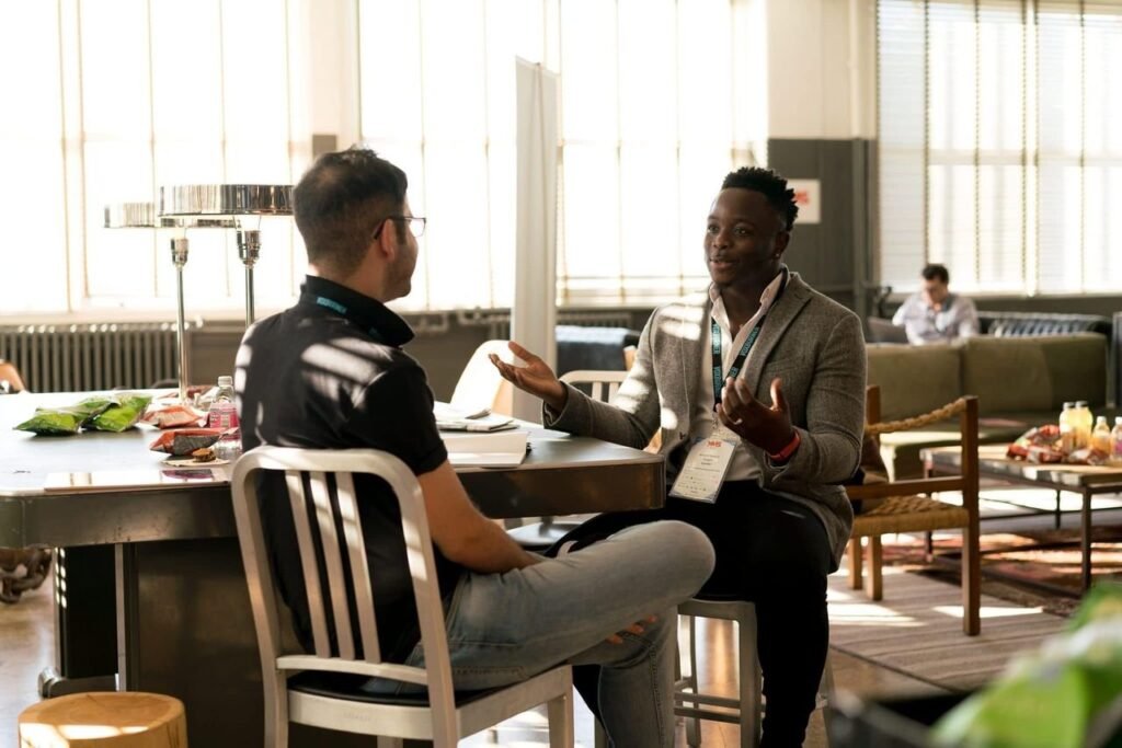 Adults discussing goals in a mentoring conversation